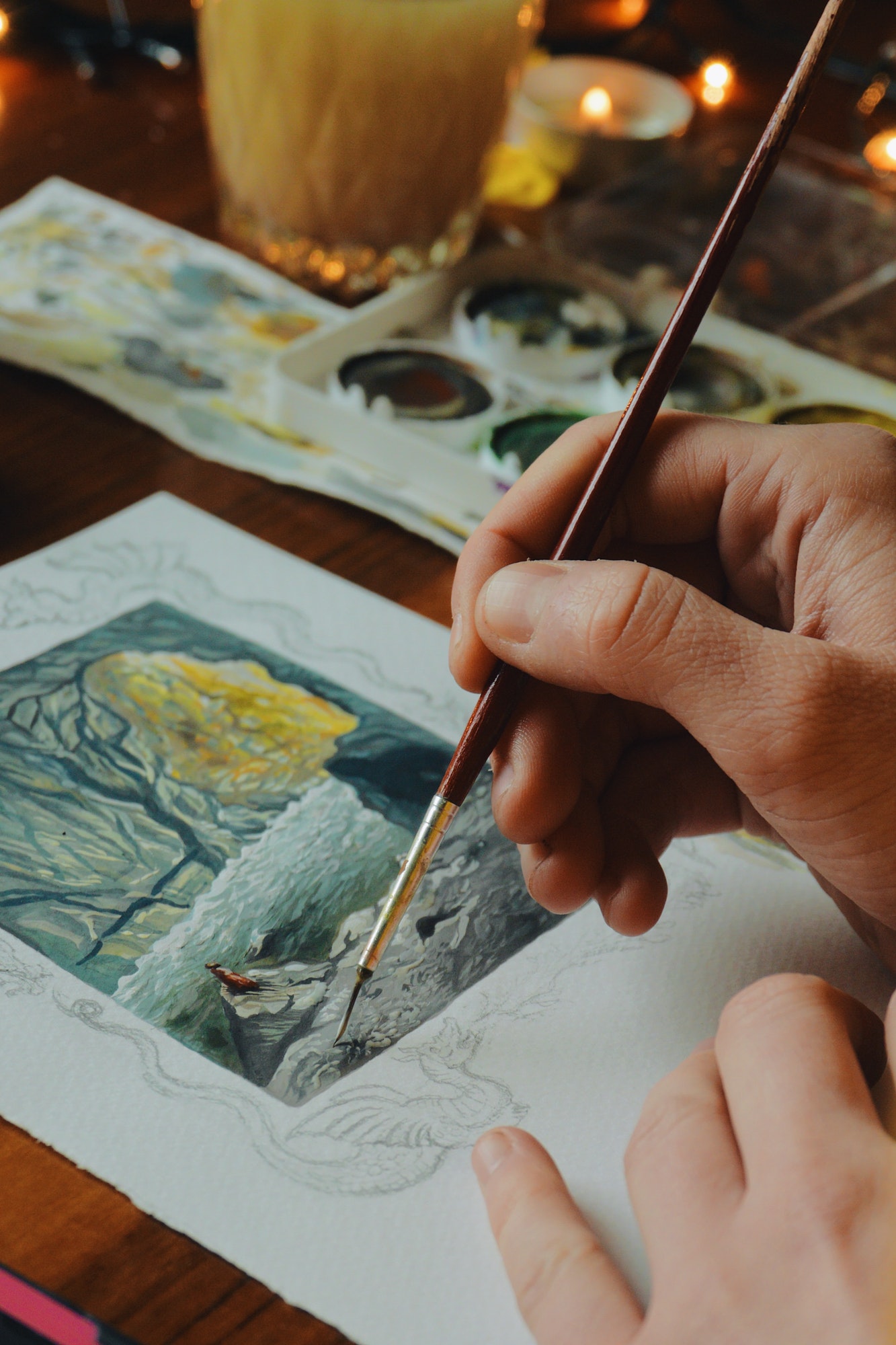 Woman Painter Artist Painting A Picture Of A Fantasy Cave With Watercolour